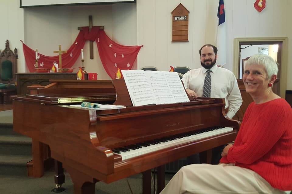 Carol and Adam at piano during Pentecost